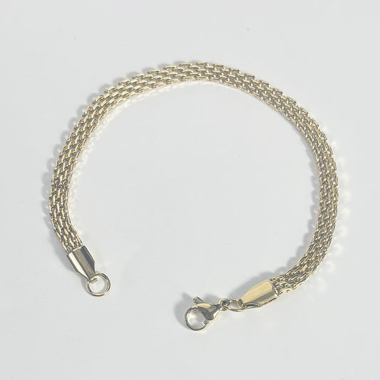 art. 016 Pulsera acero dorado dama